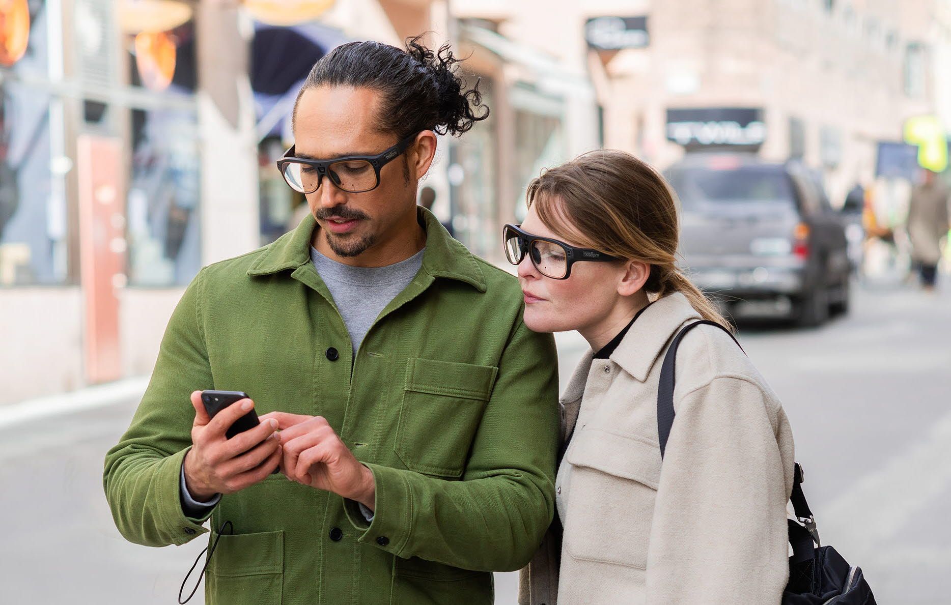 Wearing Tobii Pro Glasses 3 looking at a phone