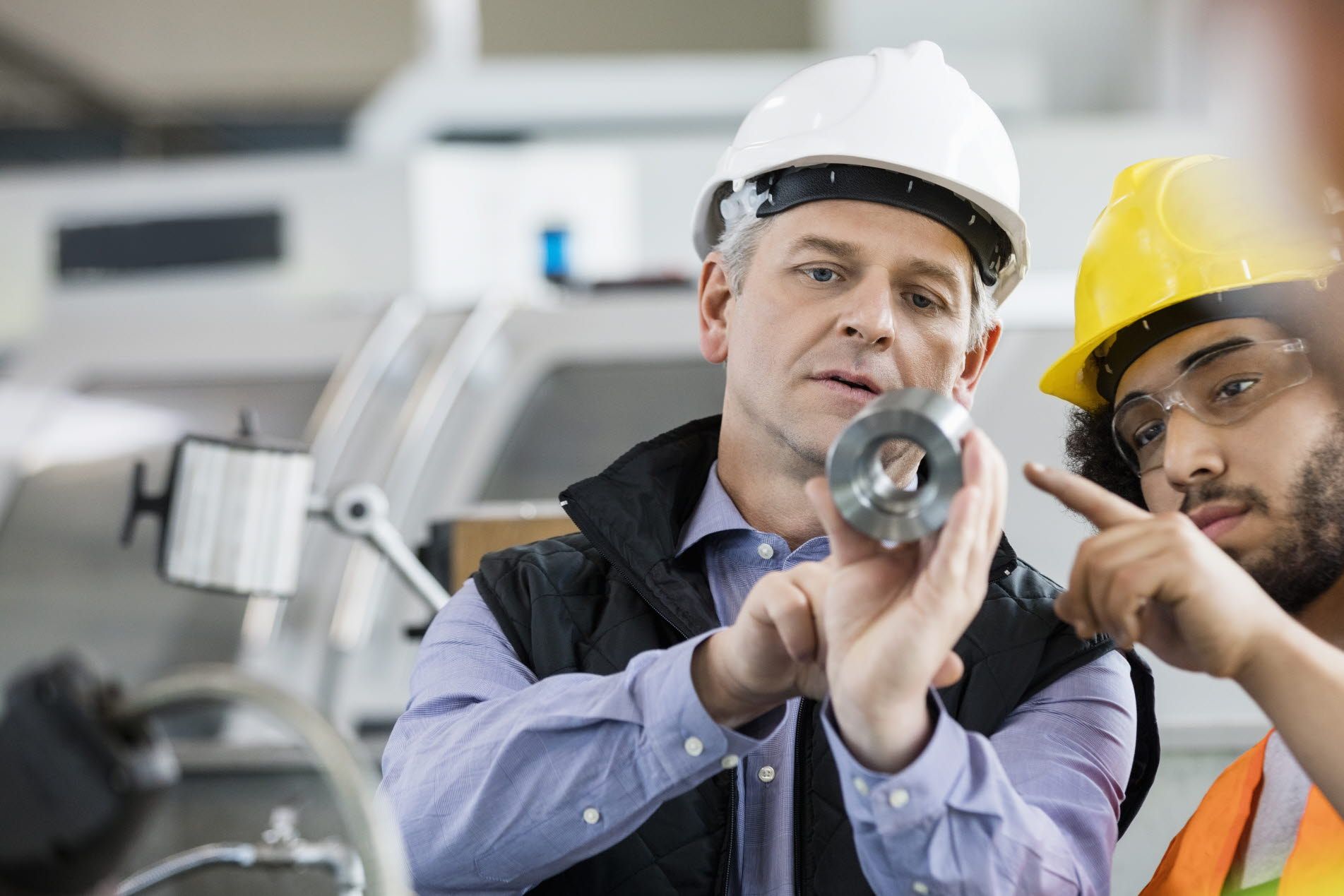 Senior staff training younger employee