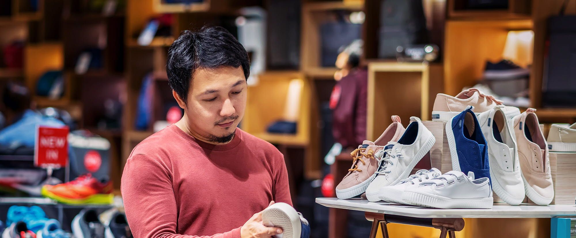 Person looking at shoes in a store