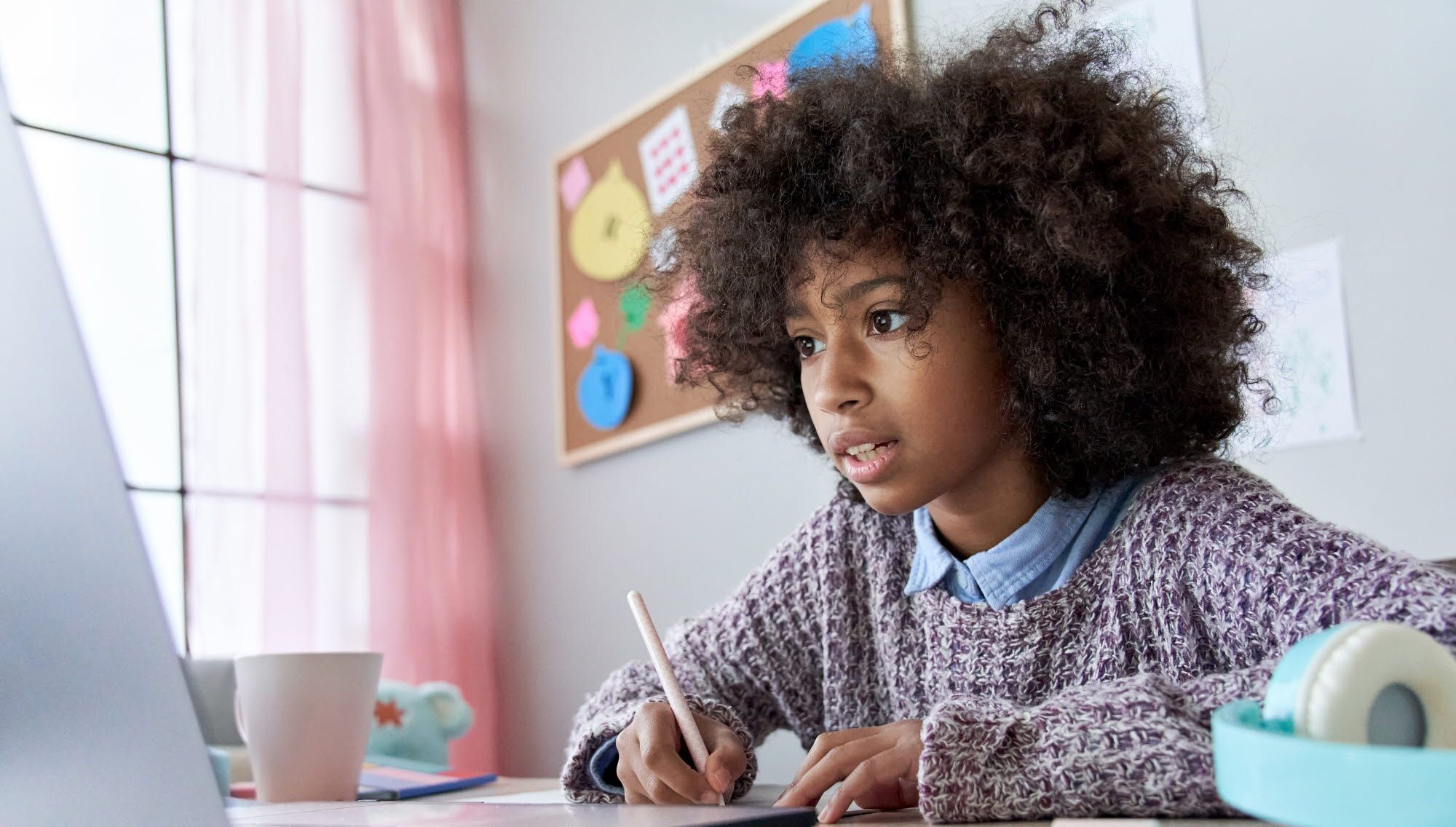 Girl doing online schooling