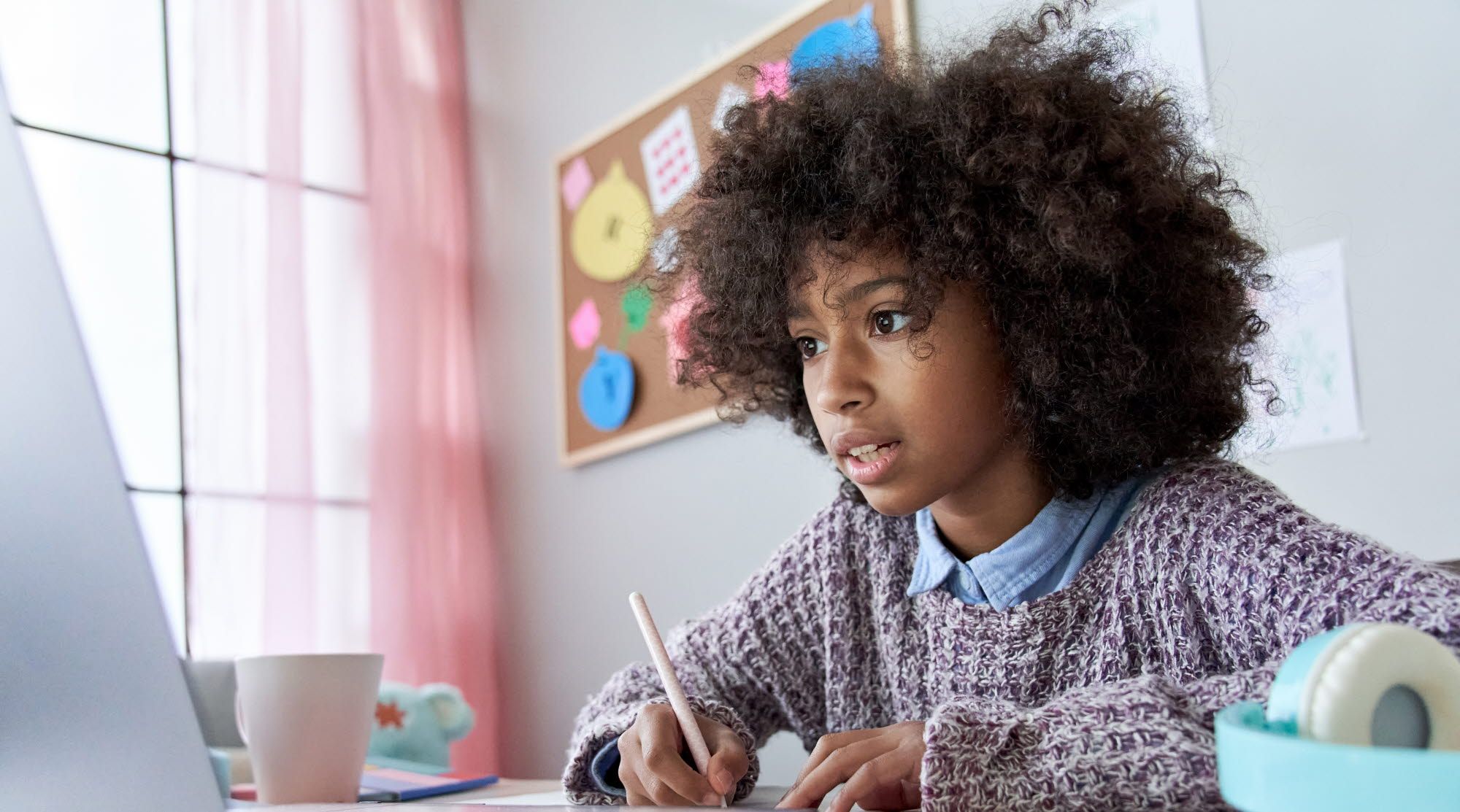 Girl doing online schooling