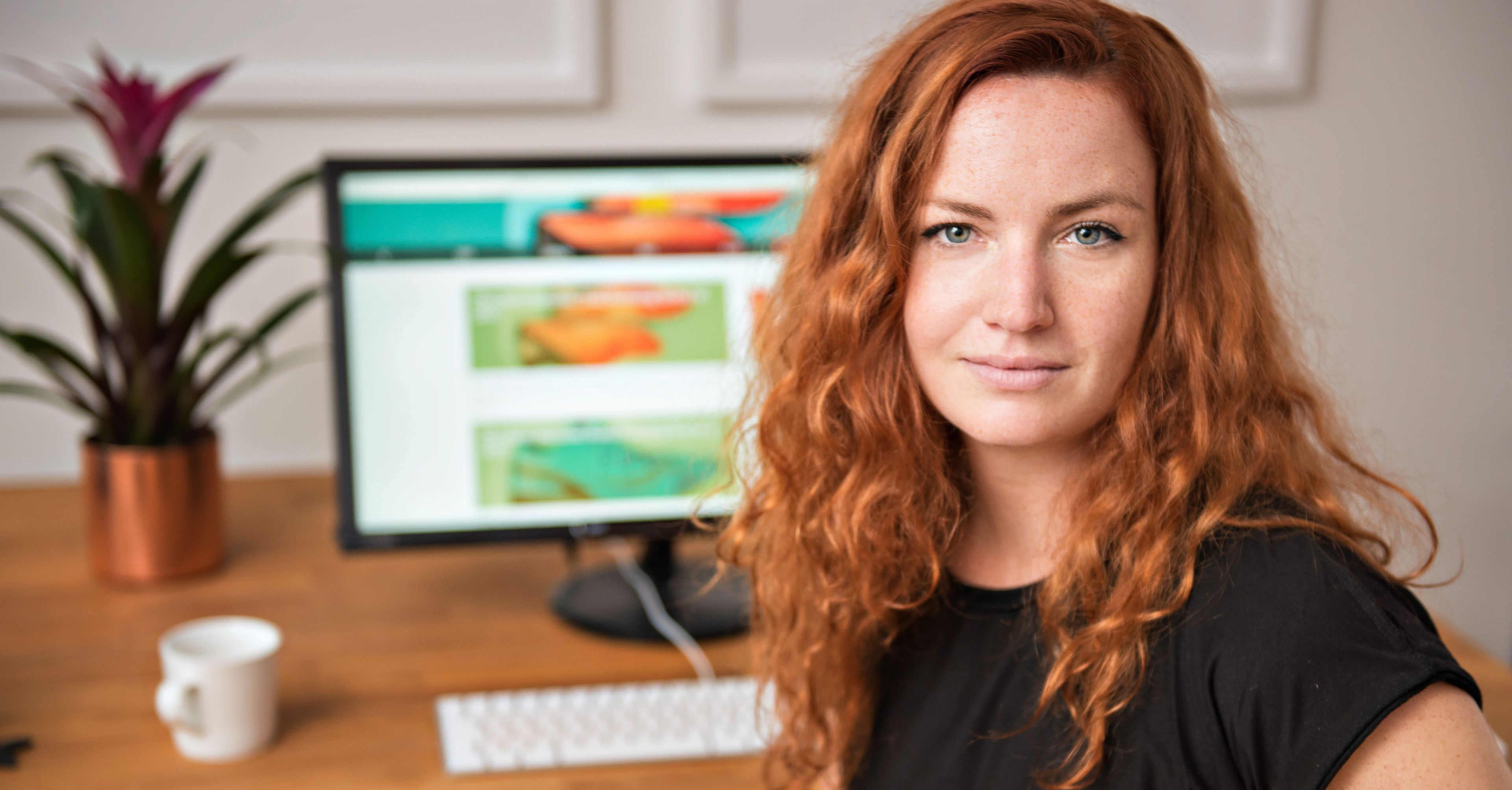 Woman sitting in front of a computer
